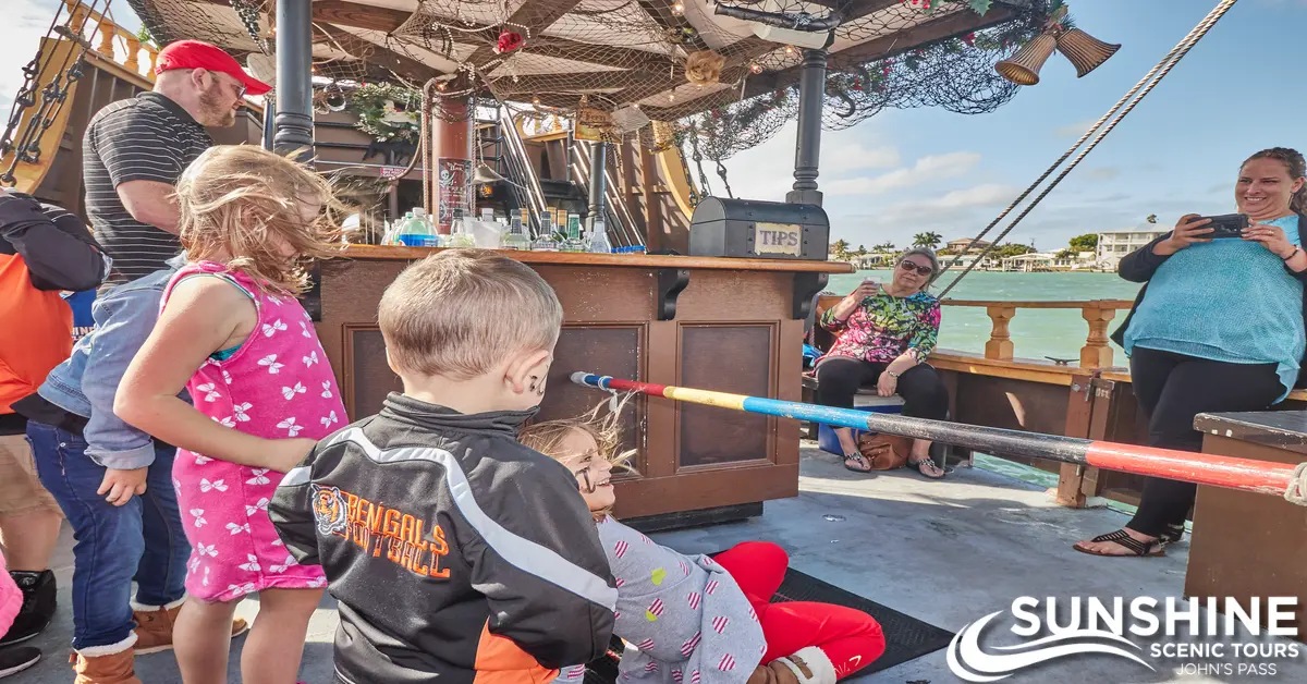 A Group of children playing on a boat | SST