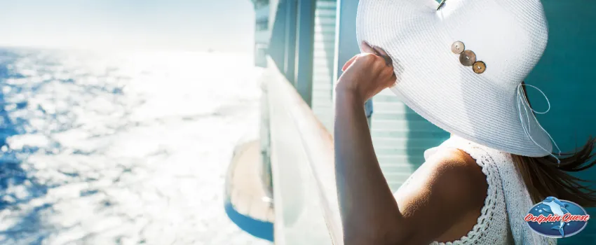 SST - A well-dressed woman, demonstrating the best things to bring on a dolphin cruise