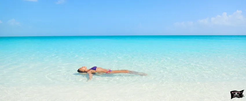 SST - A woman floating and swimming in the ocean