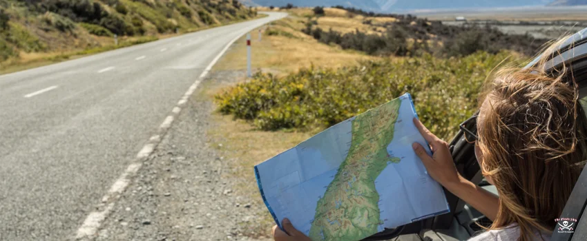 Lady Holding Florida Map On A Road